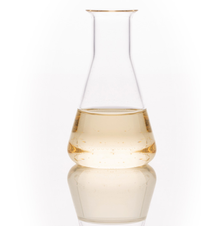 Clear cannabinoid oil in laboratory glassware