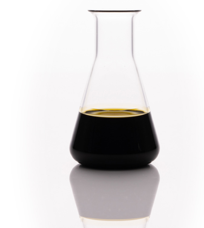 Full-spectrum cannabinoid oil in laboratory glassware